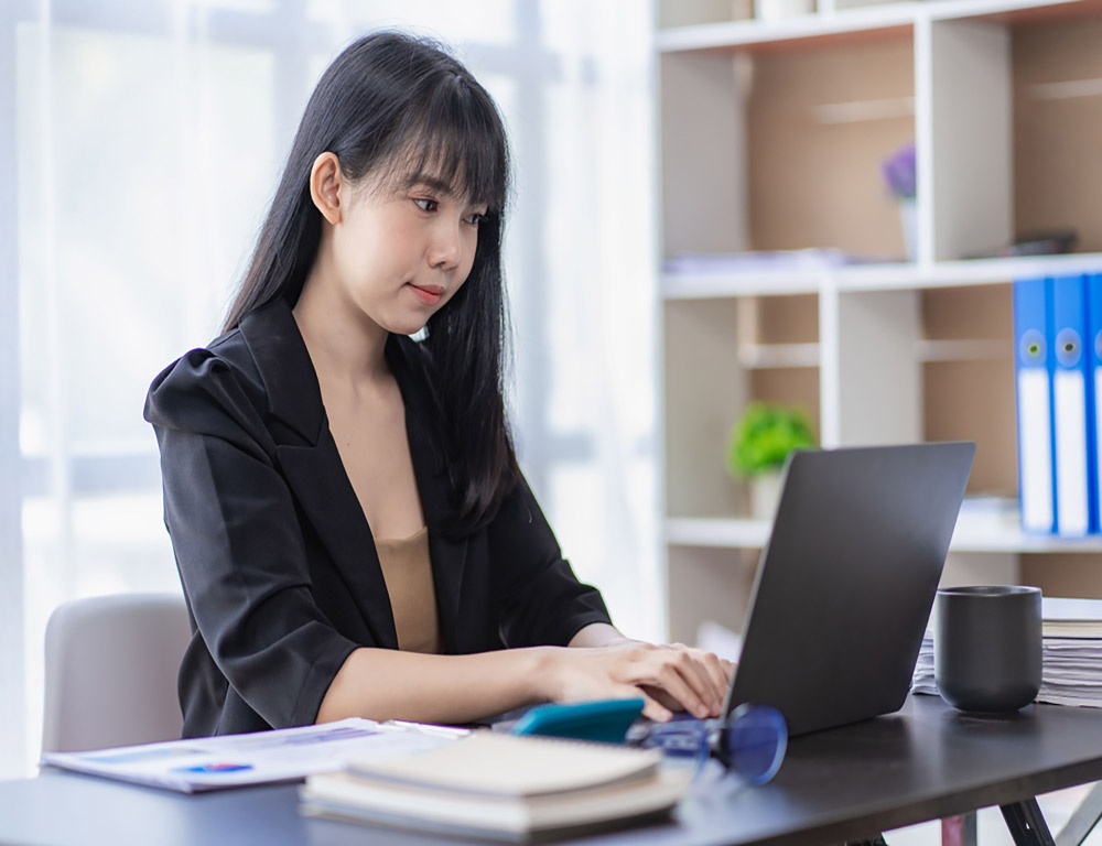 Student using laptop computer